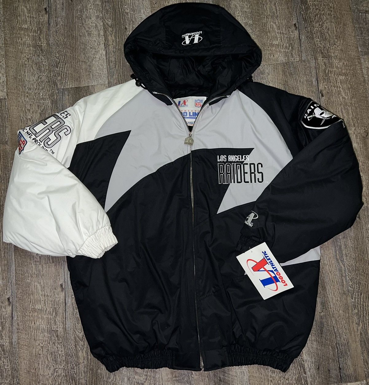 image of Logo Athletic x Pro Line VTG Los Angeles Raiders Shark Tooth Puffer Jacket Deadstock in Black (Size