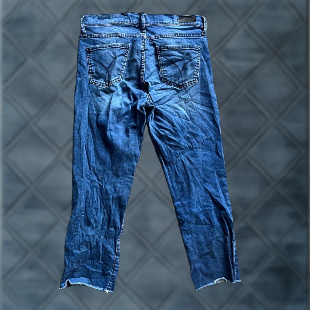 Calvin Klein Calvin Klein Jeans Ultimate Skinny Distressed Denim 12 Women 24 Inseam Medium Blue 5-Pocket Leather Logo Zip Fly Regular Size 12 Womens Size 34" / US 12 / IT 48 - 1 Thumbnail
