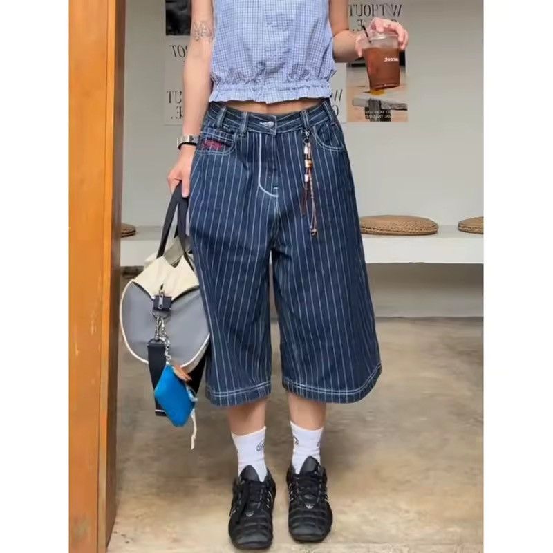 Navy blue and white pinstripe wide leg shorts