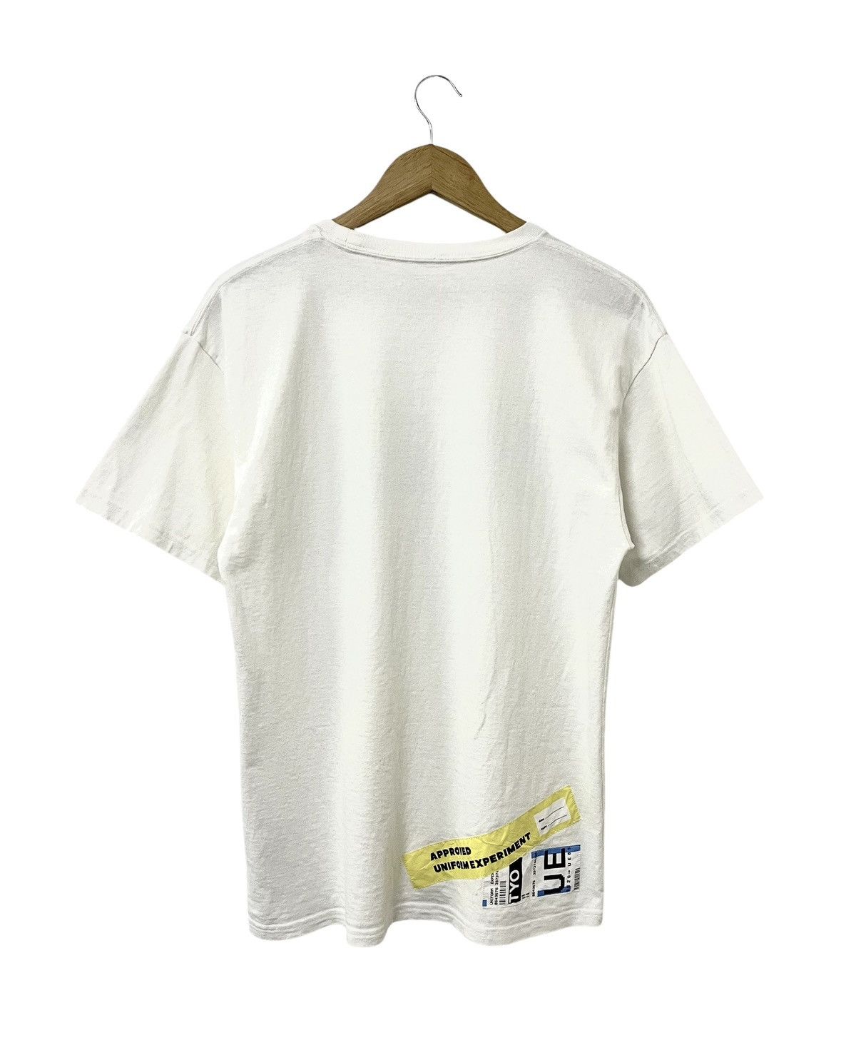 uniform experiment UNIFORM EXPERIMENT SOPHNET ATTENTION TAG JAPANESE TSHIRT Size US M / EU 48-50 / 2 - 6 Thumbnail