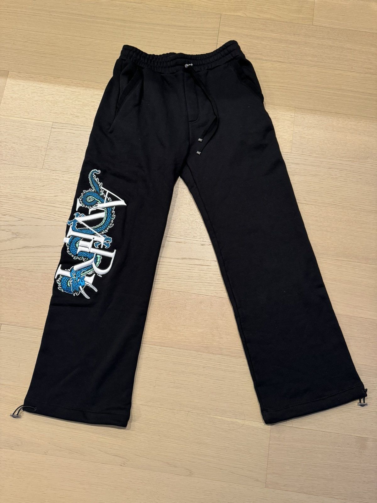 image of Amiri Cny Dragon Cotton Track Pants in Black, Men's (Size 32)