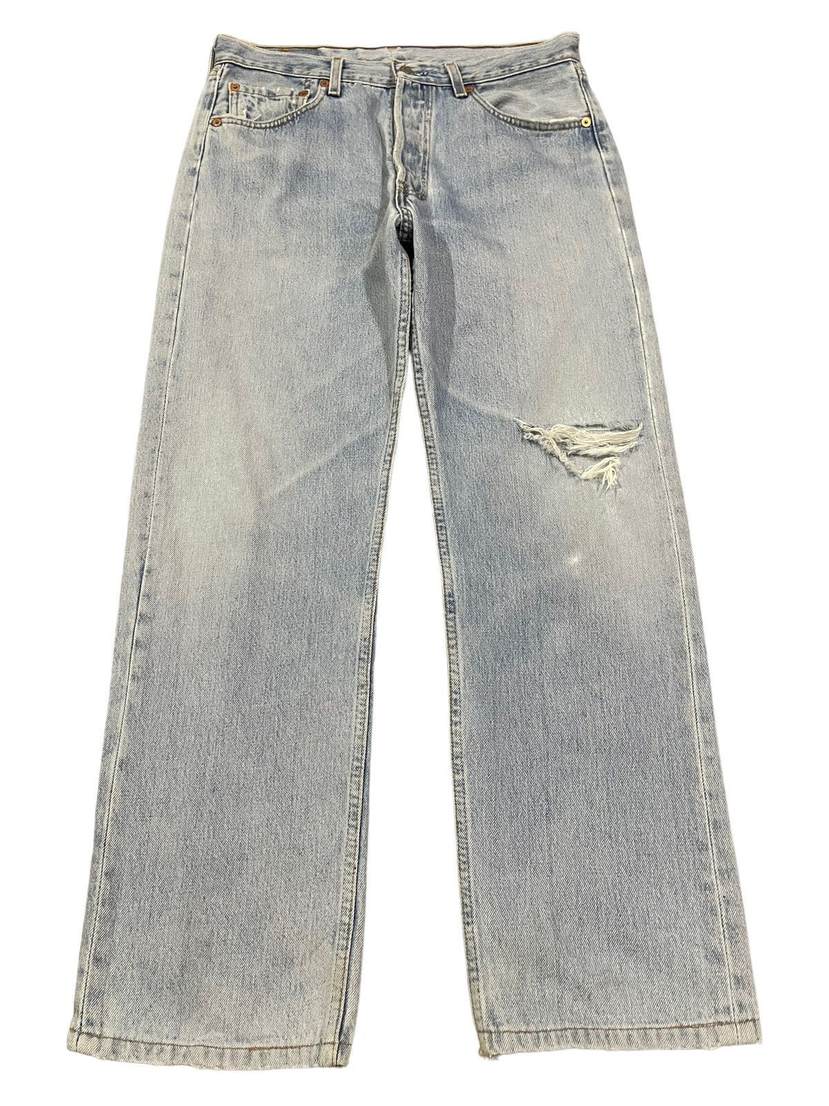 Vintage Levis 90s distressed blue wash jeans