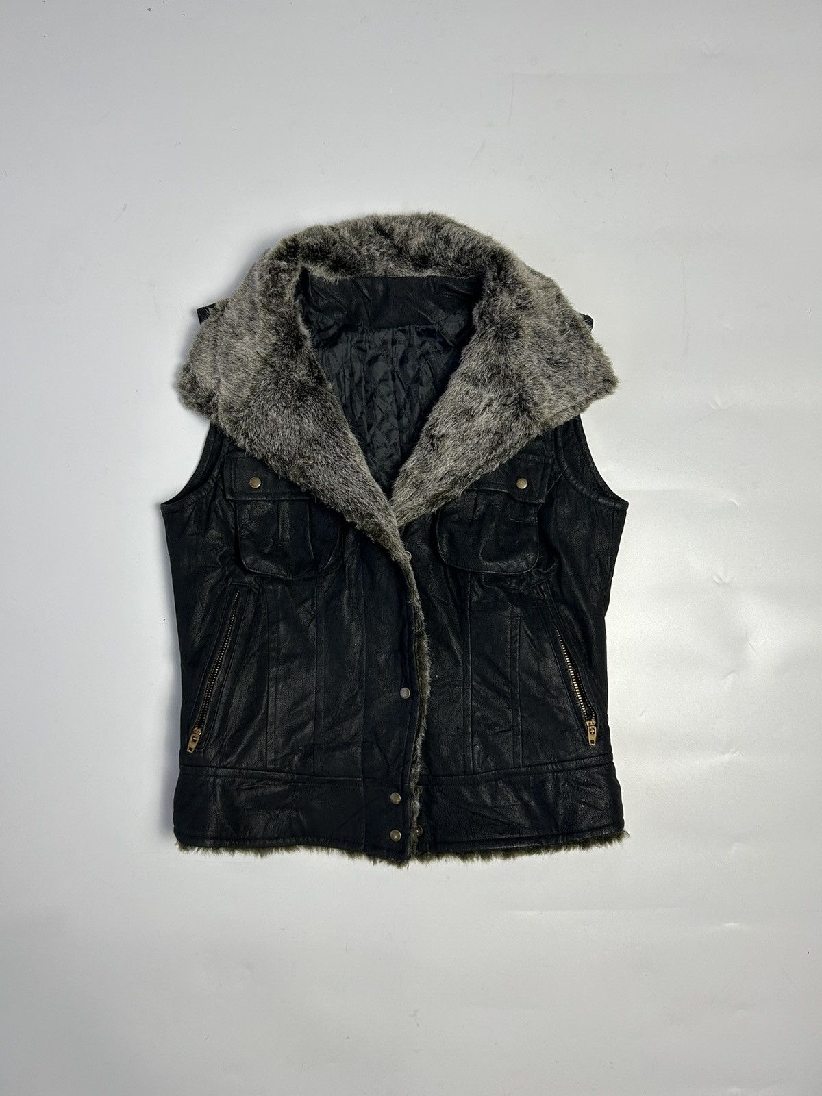 LEATHER VEST WITH FUR INSIDE LINING