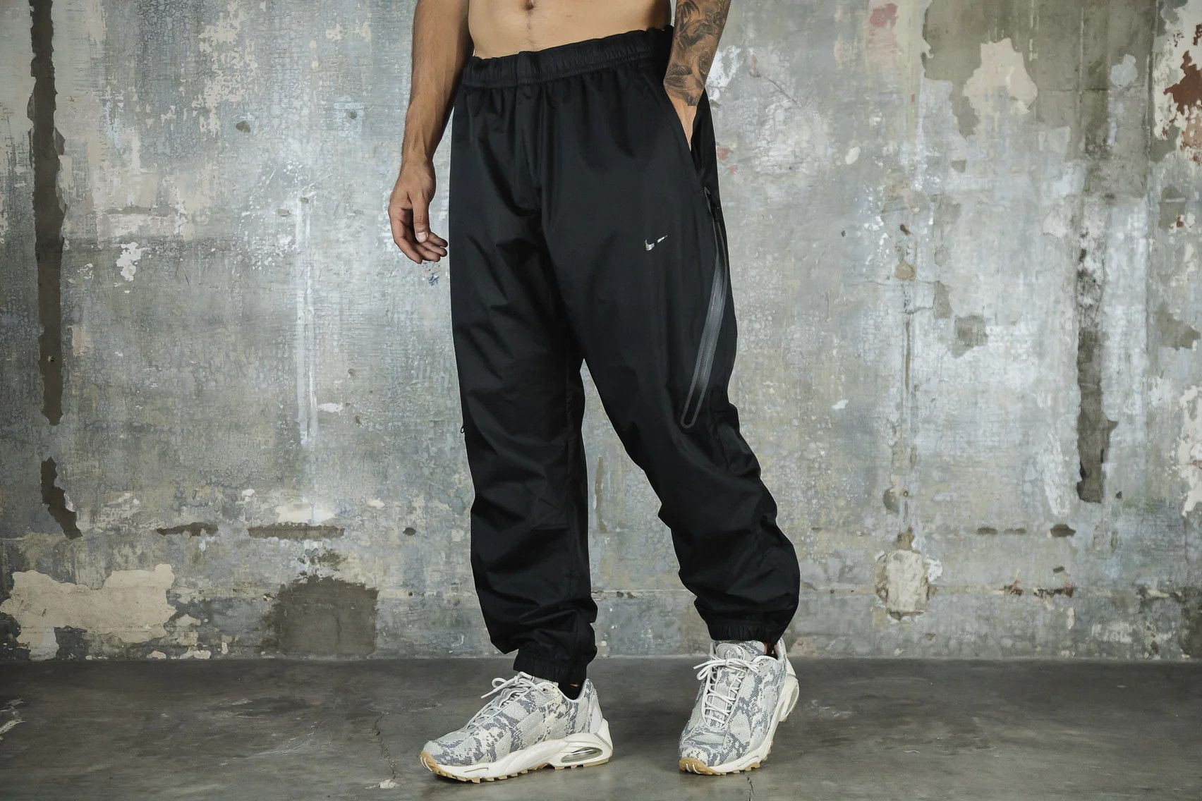 image of Nocta Nike Unisex Nrg Track Pants in Black, Men's (Size 30)