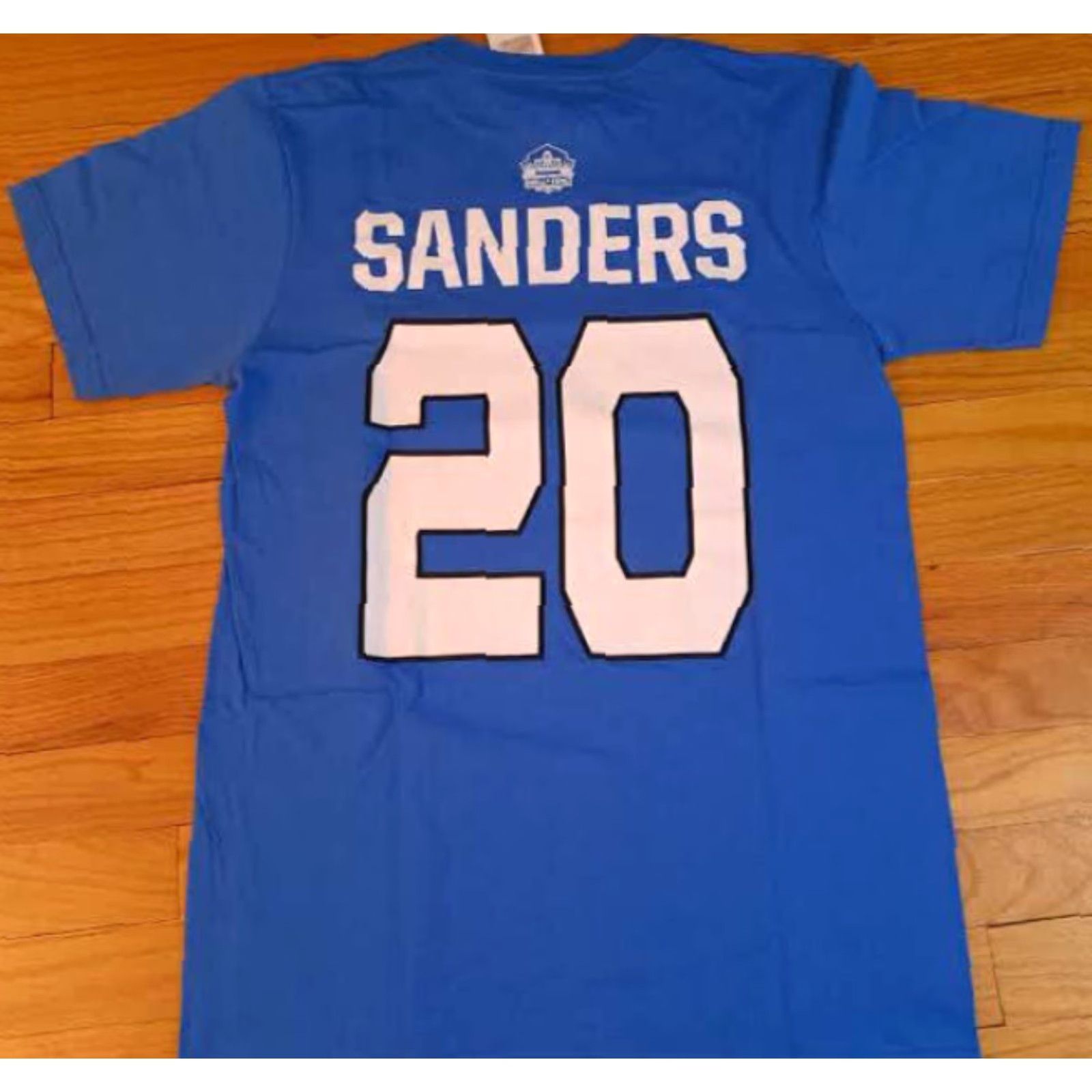 NFL VINTAGE Detroit Lions Barry Sanders Hall of Fame Medium NWT Printed T-Shirt NFL Unisex Adults M Blue Short Sleeve Shirt Mens Size US M / EU 48-50 / 2 - 6 Thumbnail
