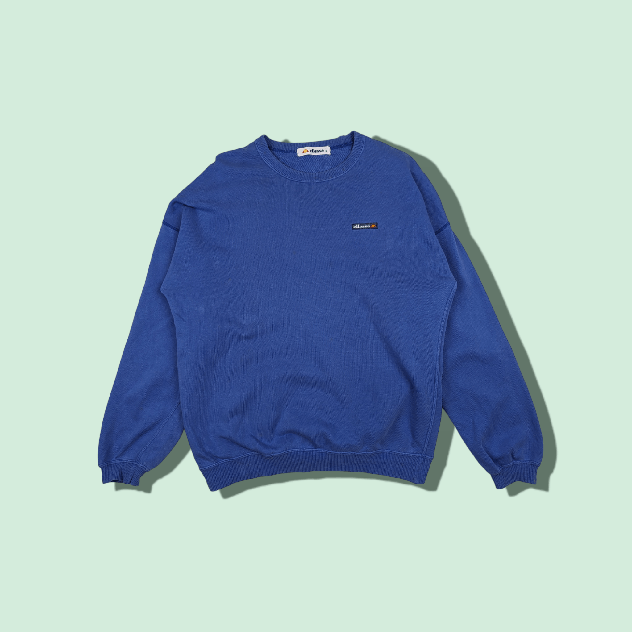 image of Vintage 90's Ellesse Sportswear Jumper Sweatshirt in Blue, Men's (Size Small)