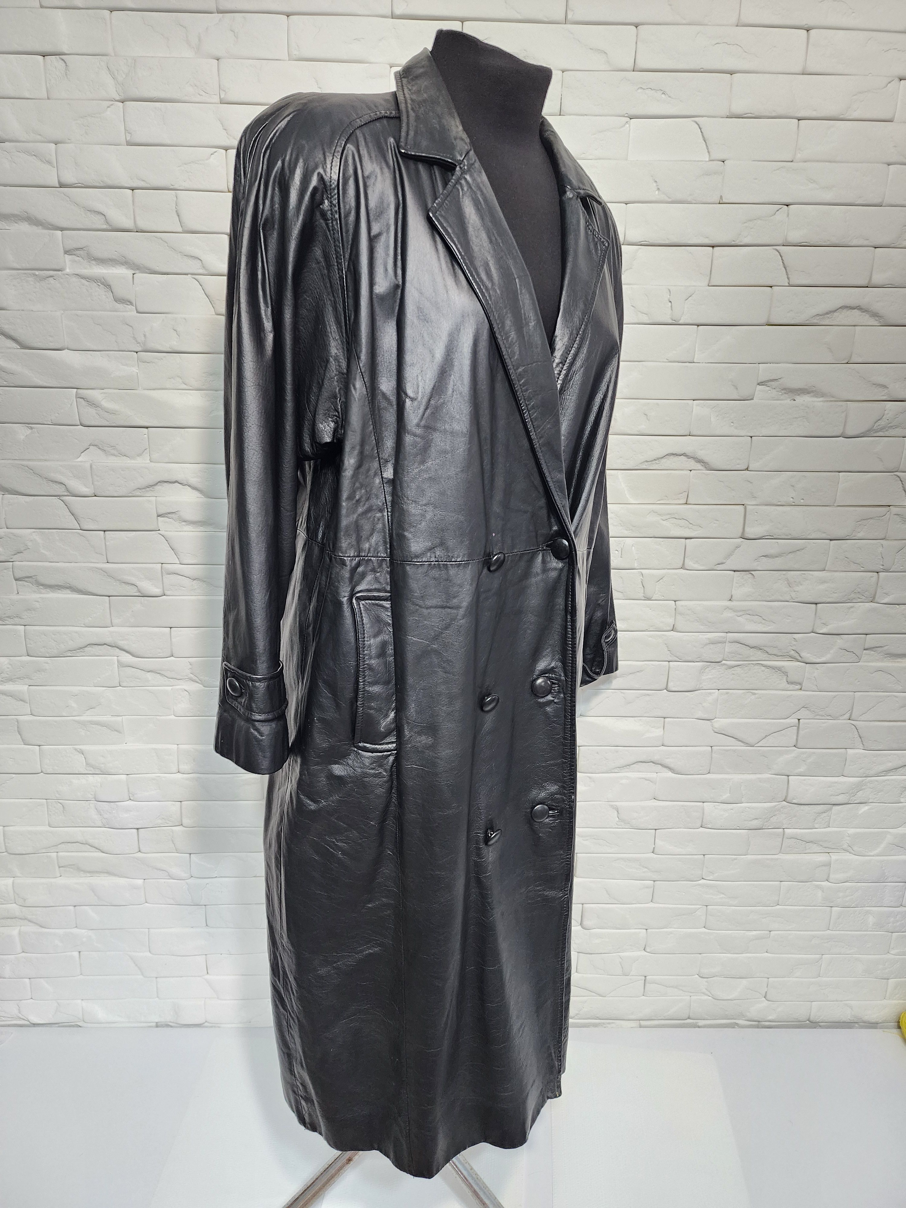 Women black leather raincoat.