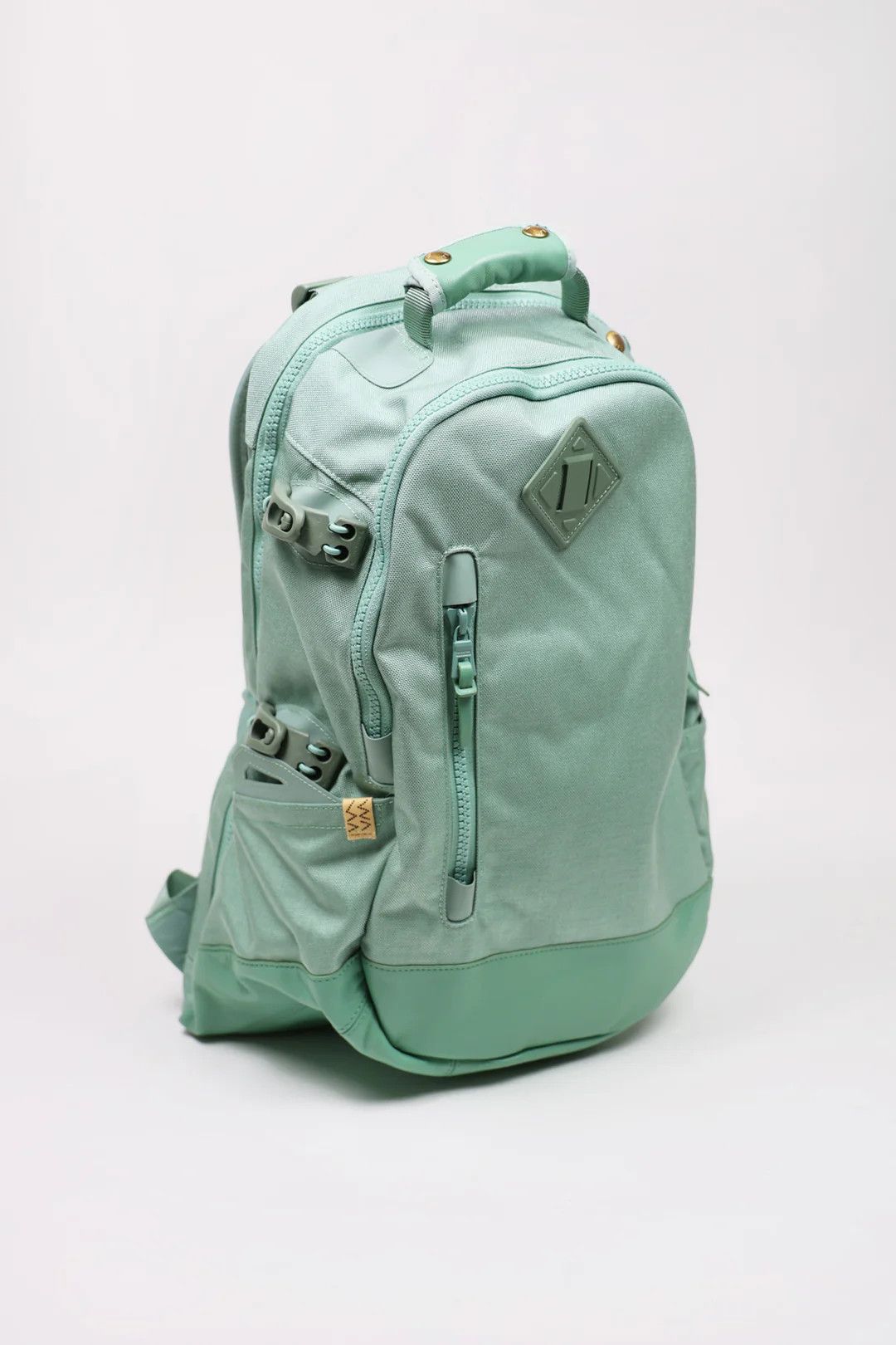 image of Visvim Leather-Trimmed Cordura Backpack in Mint Green, Men's