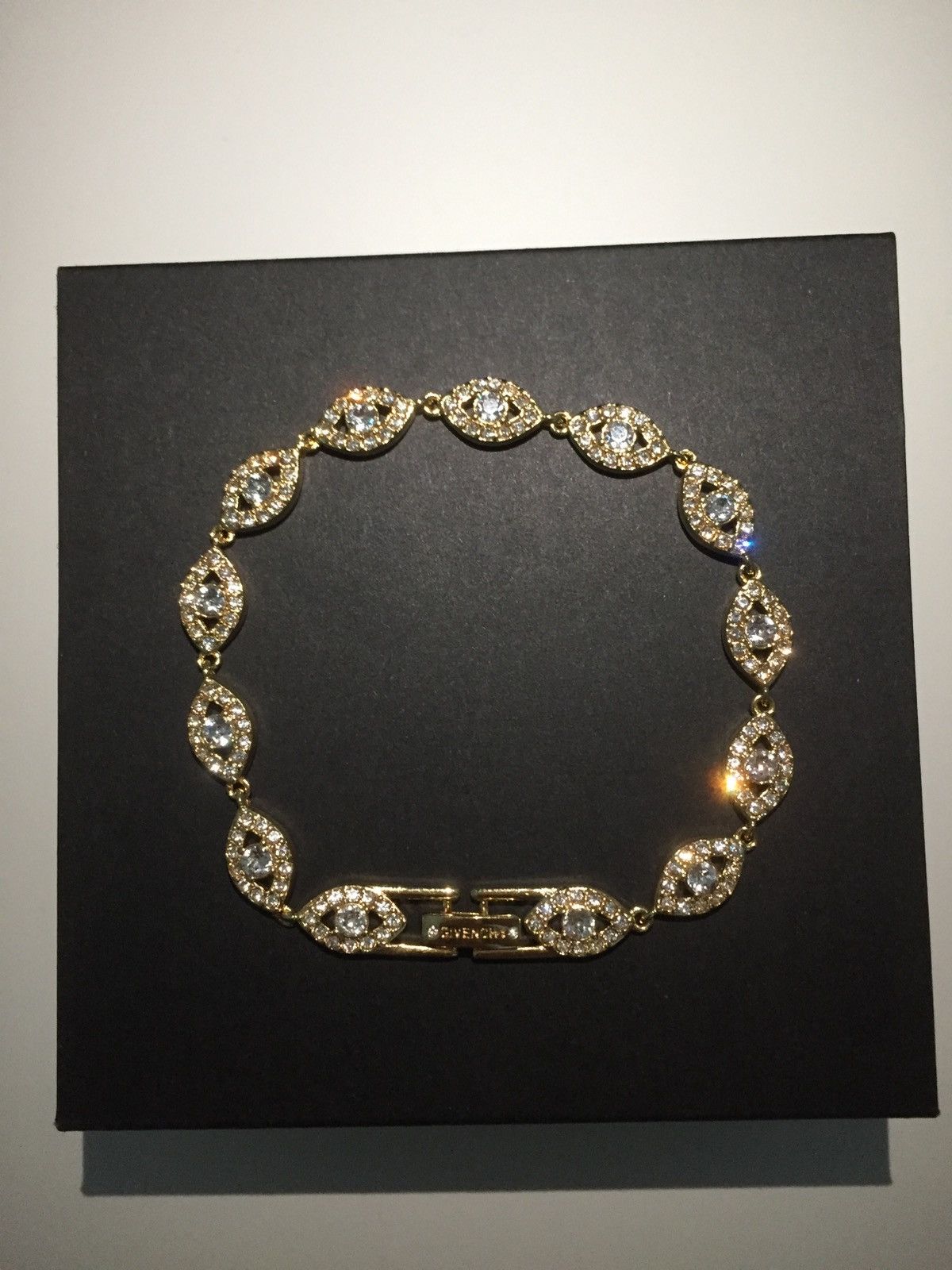 Givenchy RARE Givenchy Pave crystal orb flex bracelet | Grailed