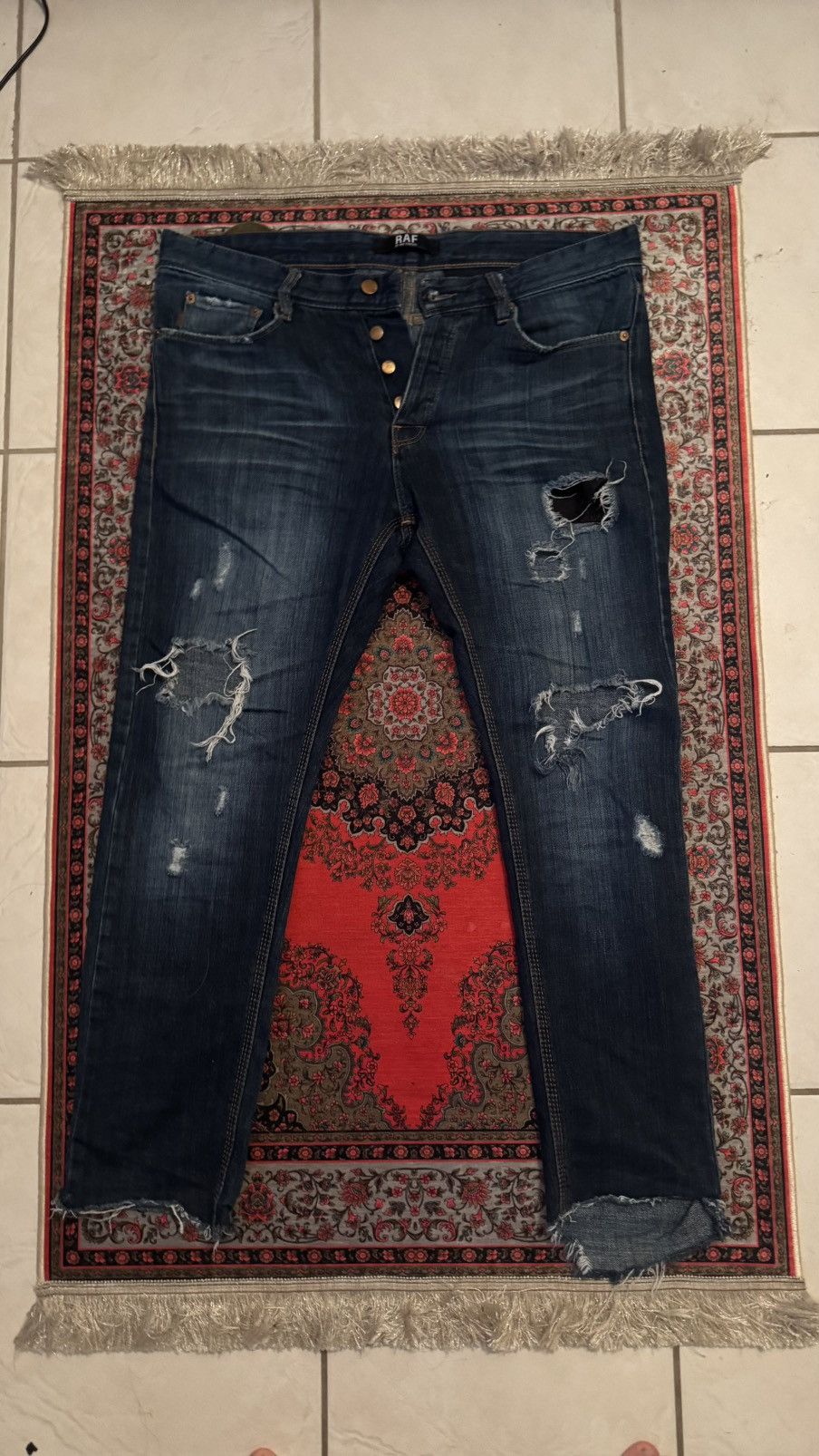 RAF by RAF Simons Blown Out Knee Distressed Denim