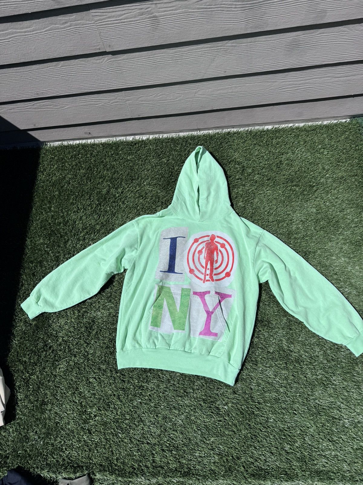 image of Cactus Plant Flea Market x Kid Cudi 2022 Governors Ball Kid Cudi XL Hoodie in Green