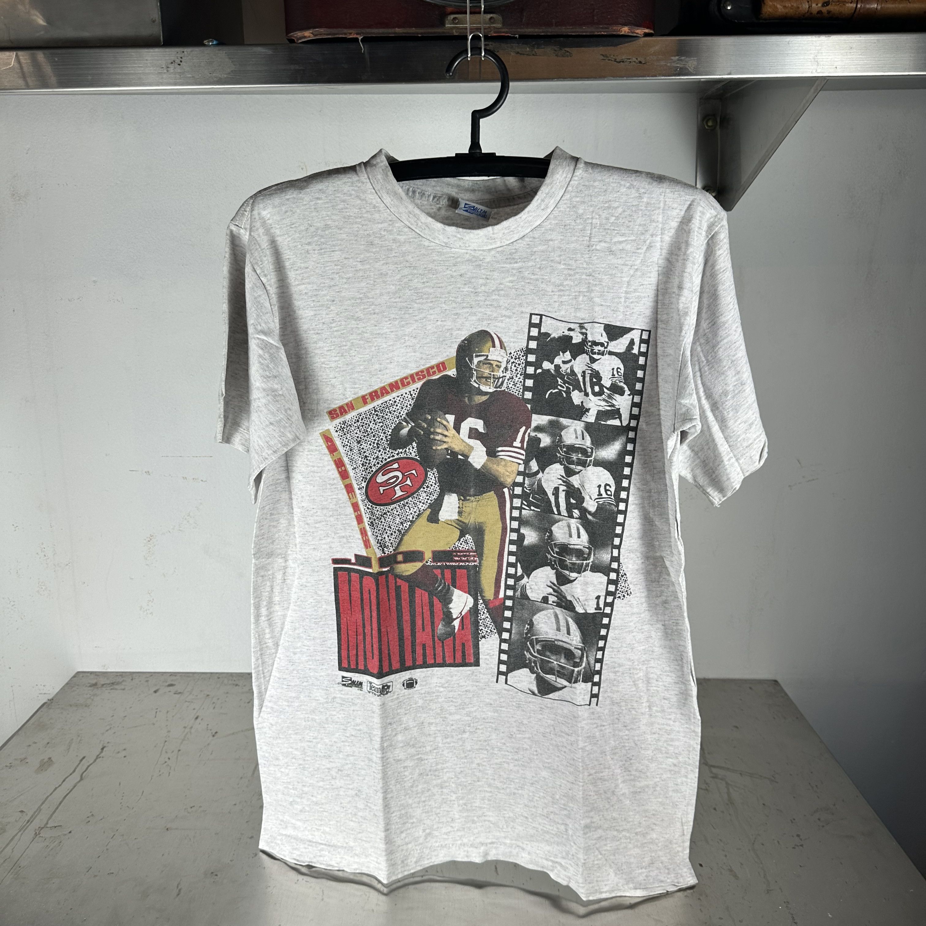 Vintage ​Vintage 1991 Joe Montana San Francisco 49ers NFL T-shirt Size US L / EU 52-54 / 3 - 1 Thumbnail