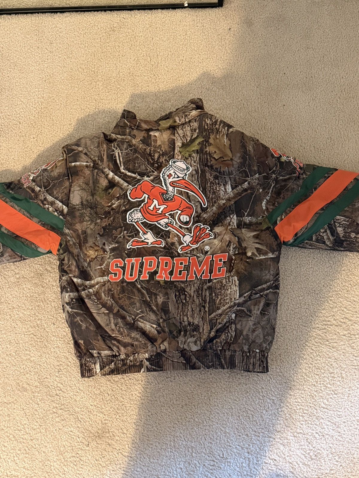Mitchell & Ness × NCAA × Supreme Supreme x Mitchell & Ness NCAA 'TrueTimber Kanati Camo' Size US S / EU 44-46 / 1 - 3 Thumbnail