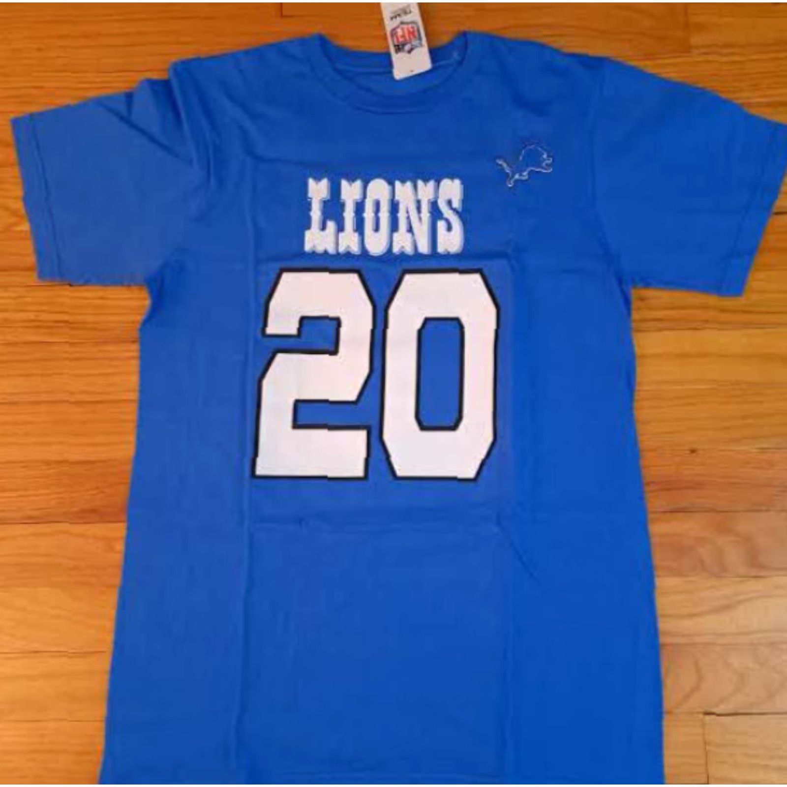 NFL VINTAGE Detroit Lions Barry Sanders Hall of Fame Medium NWT Printed T-Shirt NFL Unisex Adults M Blue Short Sleeve Shirt Mens Size US M / EU 48-50 / 2 - 4 Thumbnail