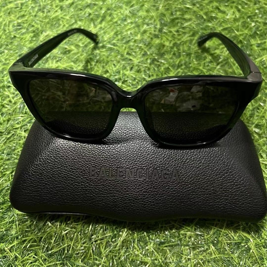 image of Balenciaga Sunglasses in Black, Women's