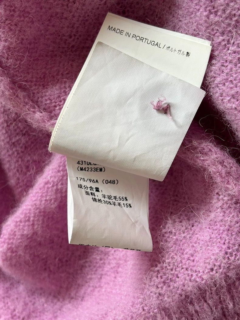 our legacy Pink sweater