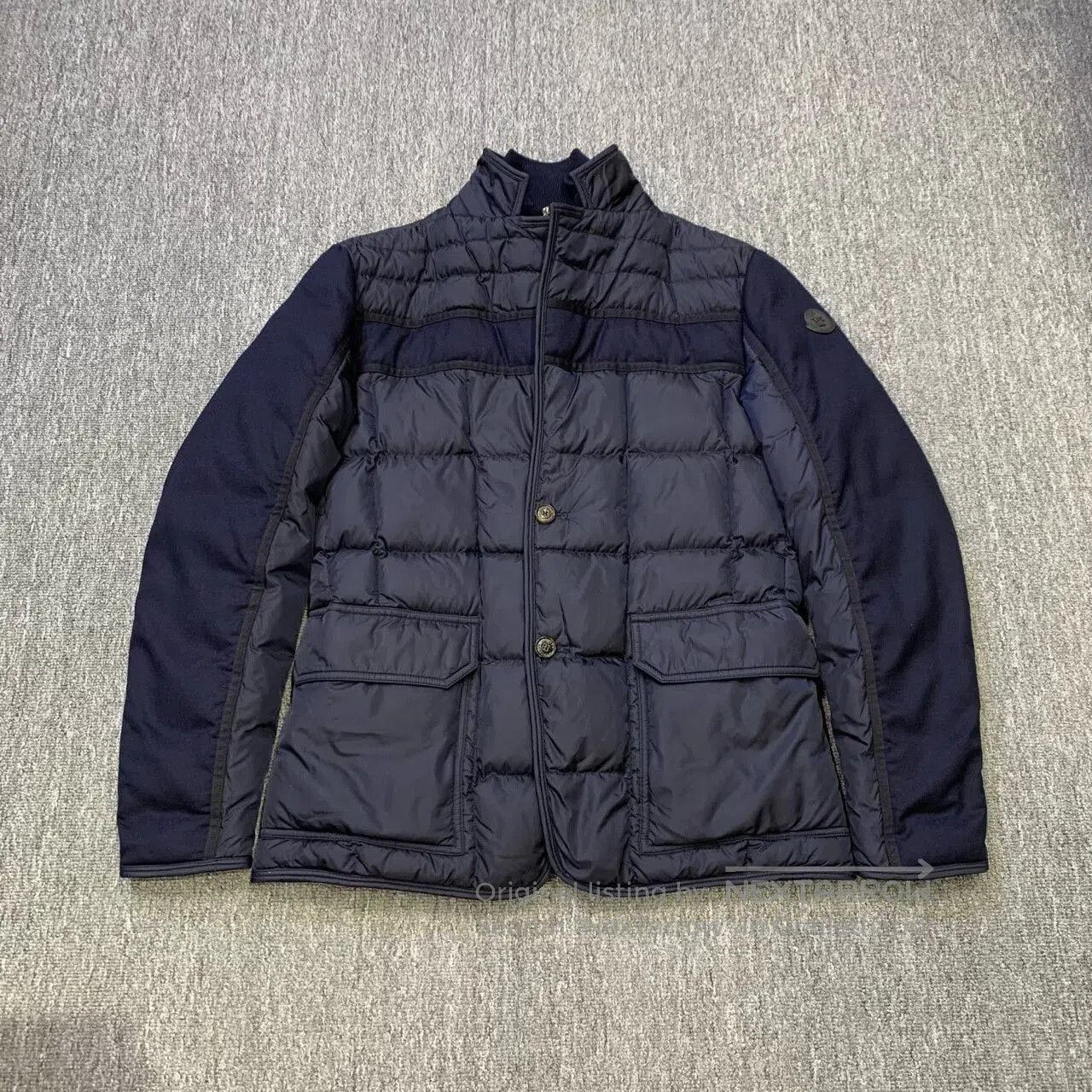 moncler deep blue down jacket with detachable design.