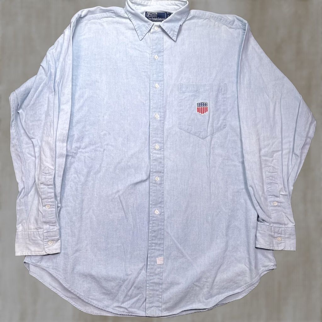 Polo Ralph Lauren Polo Ralph Lauren Shirt Mens Large Blue Chambray Long Sleeve USA Flag Shield Button-Up Chest Pocket Embroidered Size US L / EU 52-54 / 3 - 1 Thumbnail