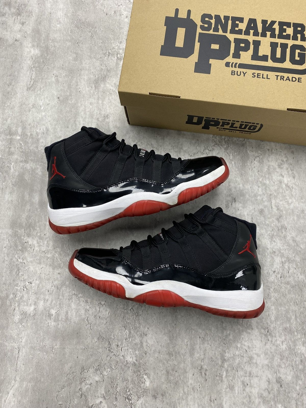 Size 8.5M - Jordan 11 Retro “Bred” 2012
