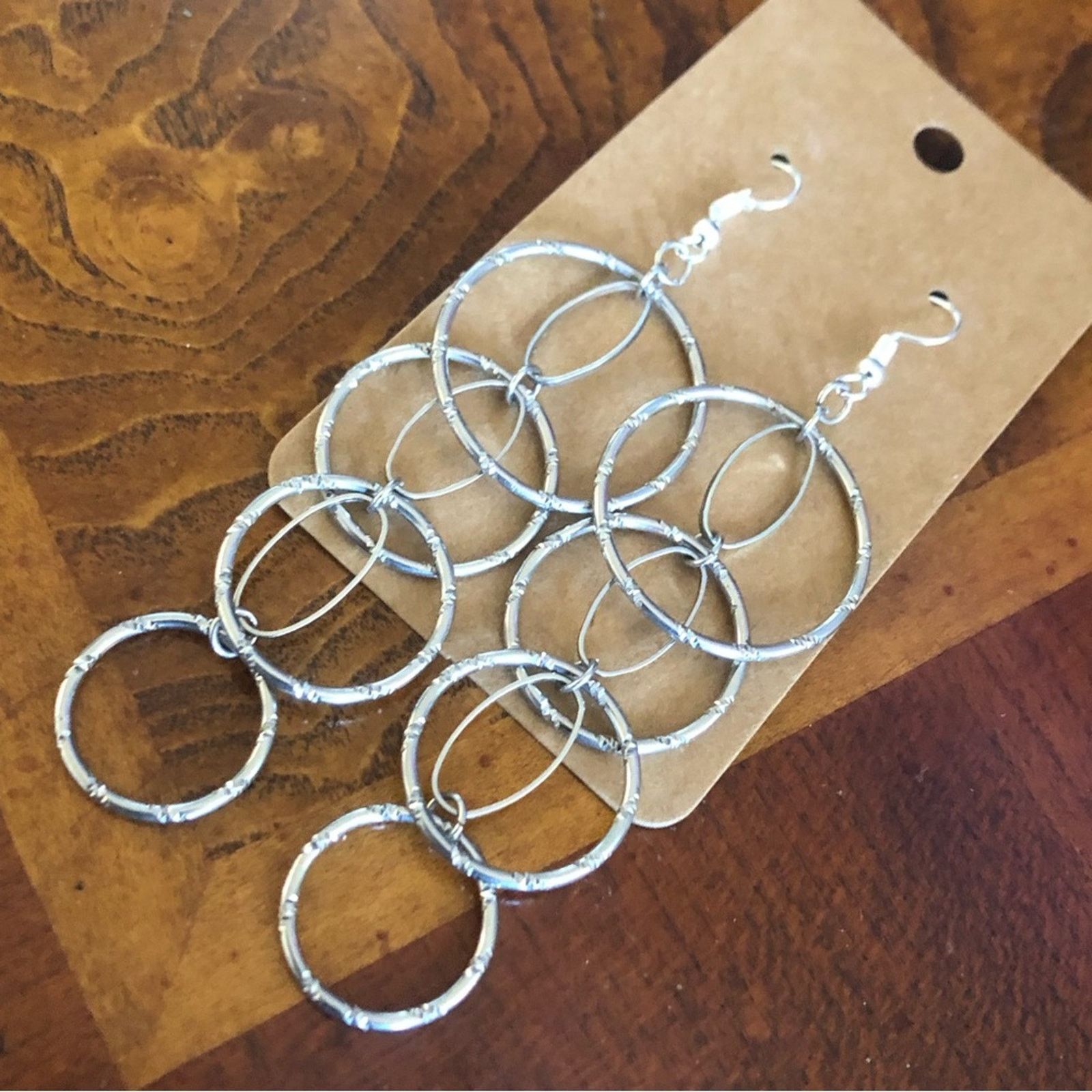 Jewelry Shiny silver plated tiered textured ring dangle earrings Size ONE SIZE - 1 Thumbnail