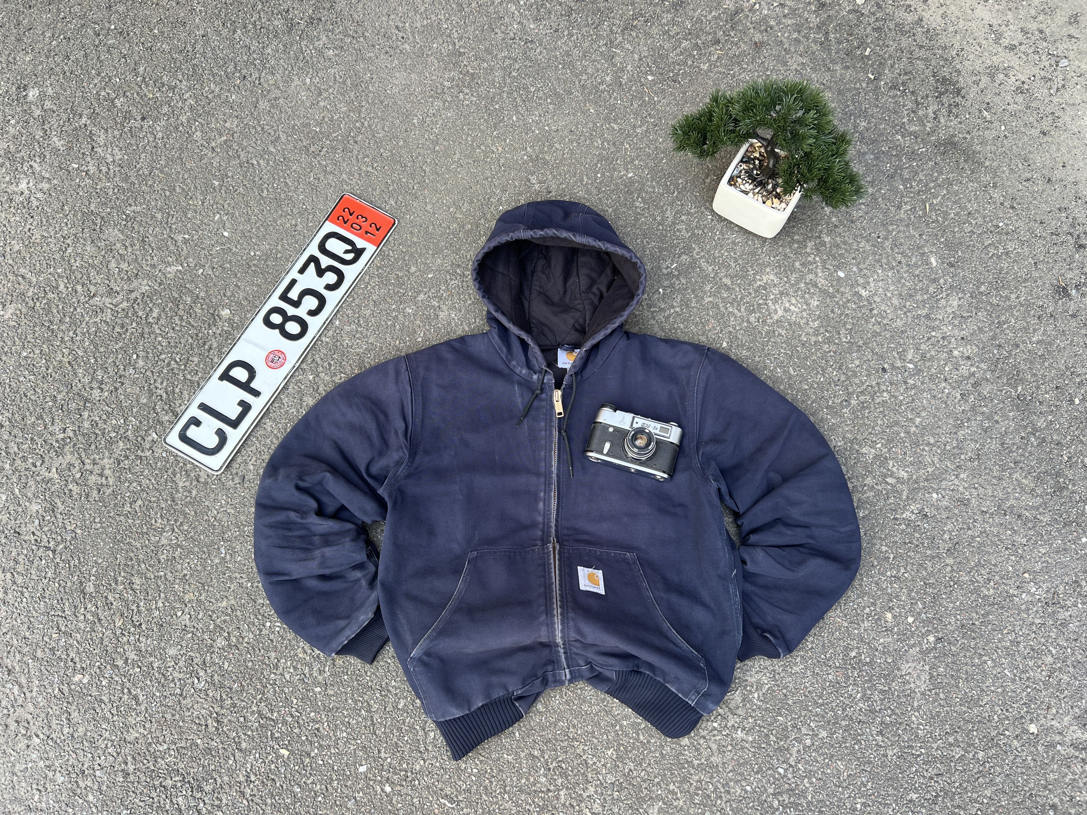 image of Vintage Carhartt Sunfaded Hooded Active Jacket in Dark Blue, Men's (Size Medium)