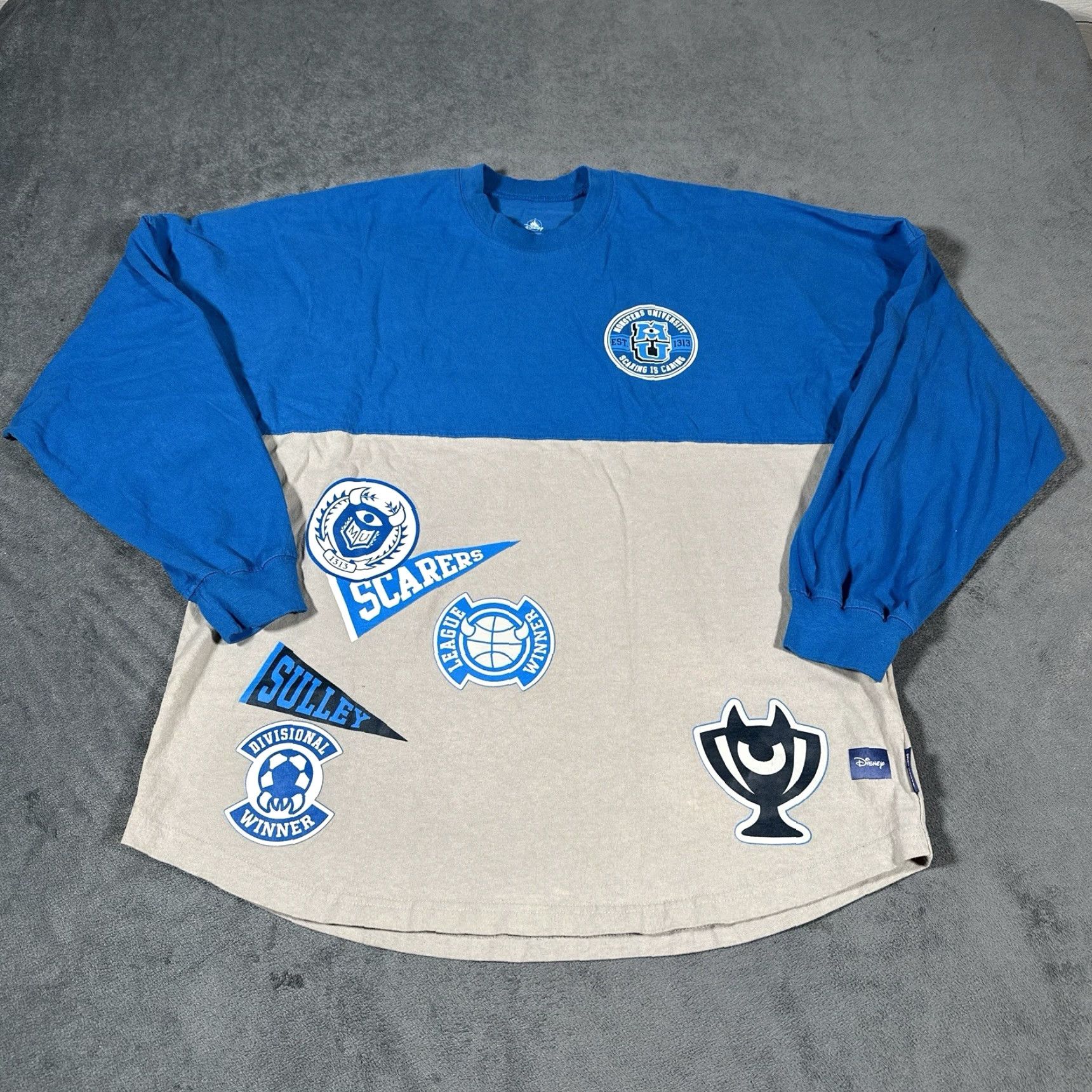 Disney Disney Monsters University Spirit Jersey Shirt Mens Medium Long Sleeve Pullover Graphic Print Blue Nike? Wait no. Size US M / EU 48-50 / 2 - 6 Thumbnail