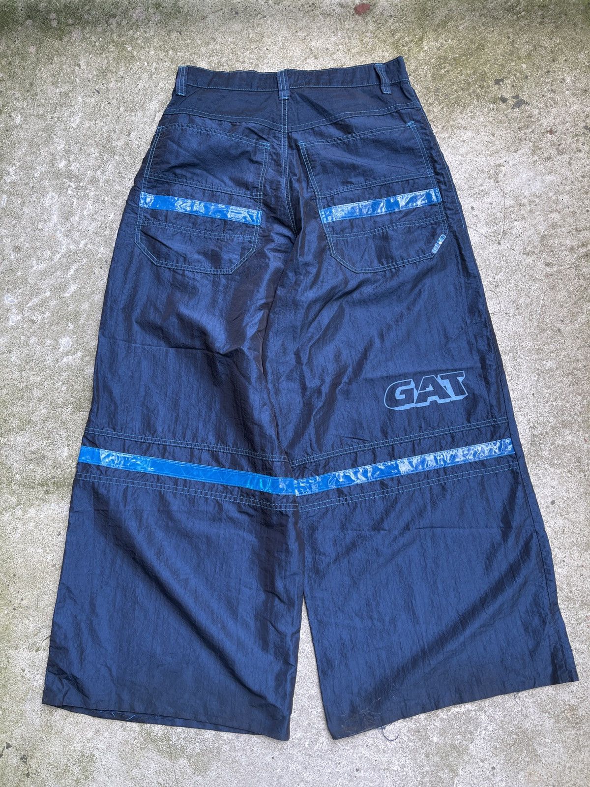 Vintage VINTAGE 90s GAT CRAZY BLUE NYLON BAGGY RAVE PANTS 34 | Grailed