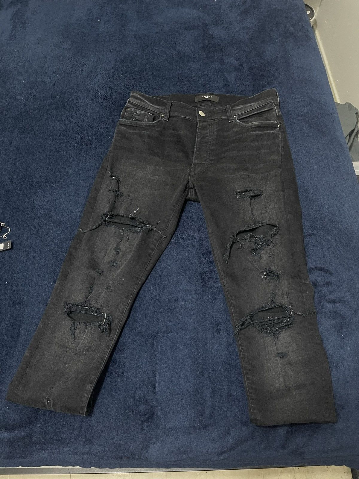 Amiri jeans thrasher
