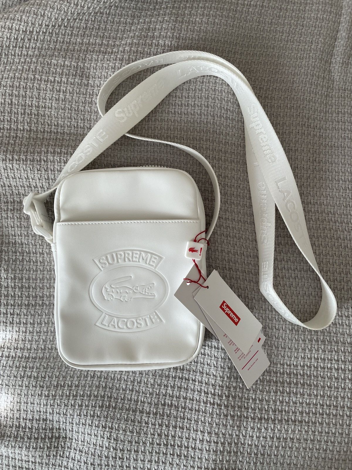 Supreme x lacoste bag online