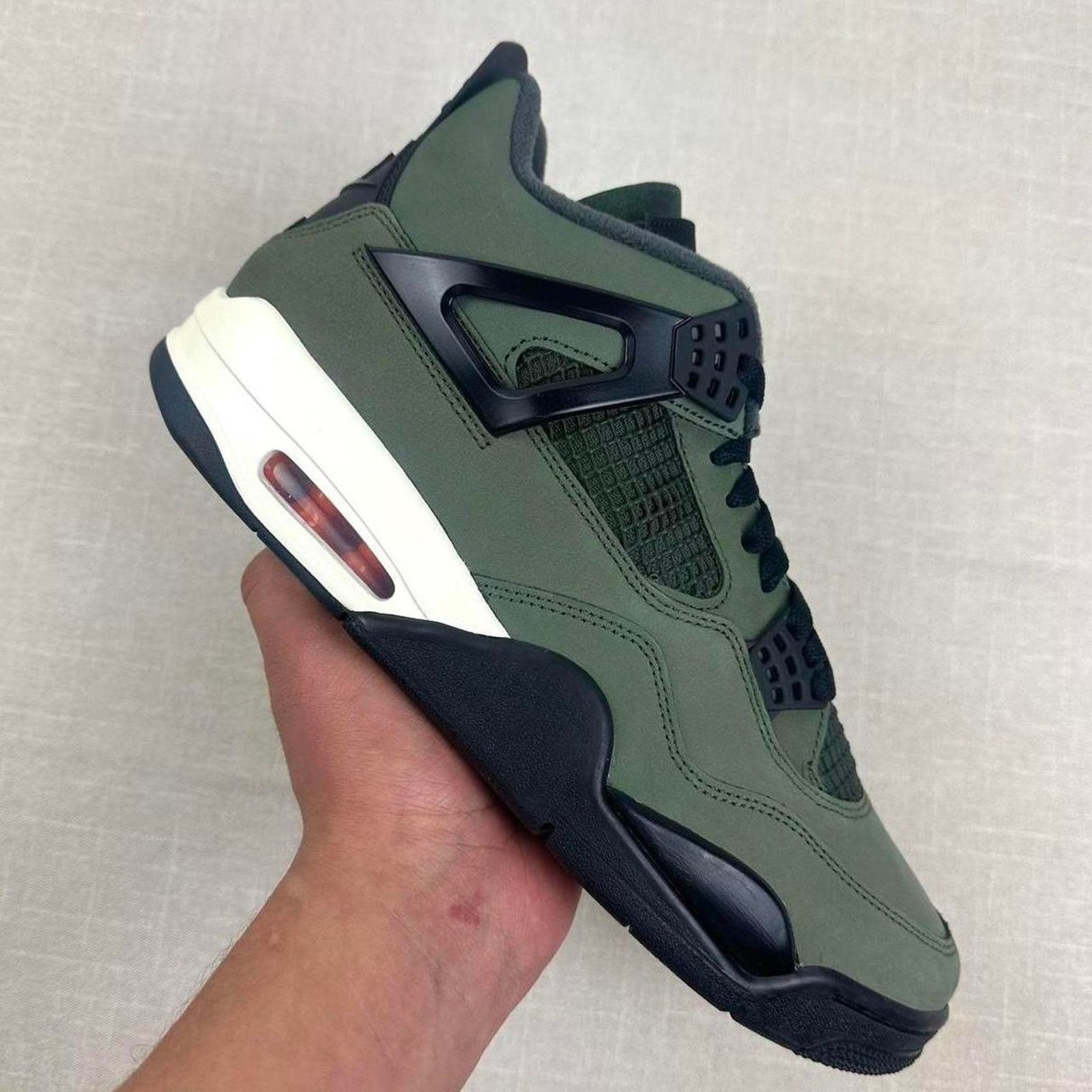Jordan Brand 🫒 Jordan 4 "Undefeated" 10M Size US 10 / EU 43 - 1 Thumbnail
