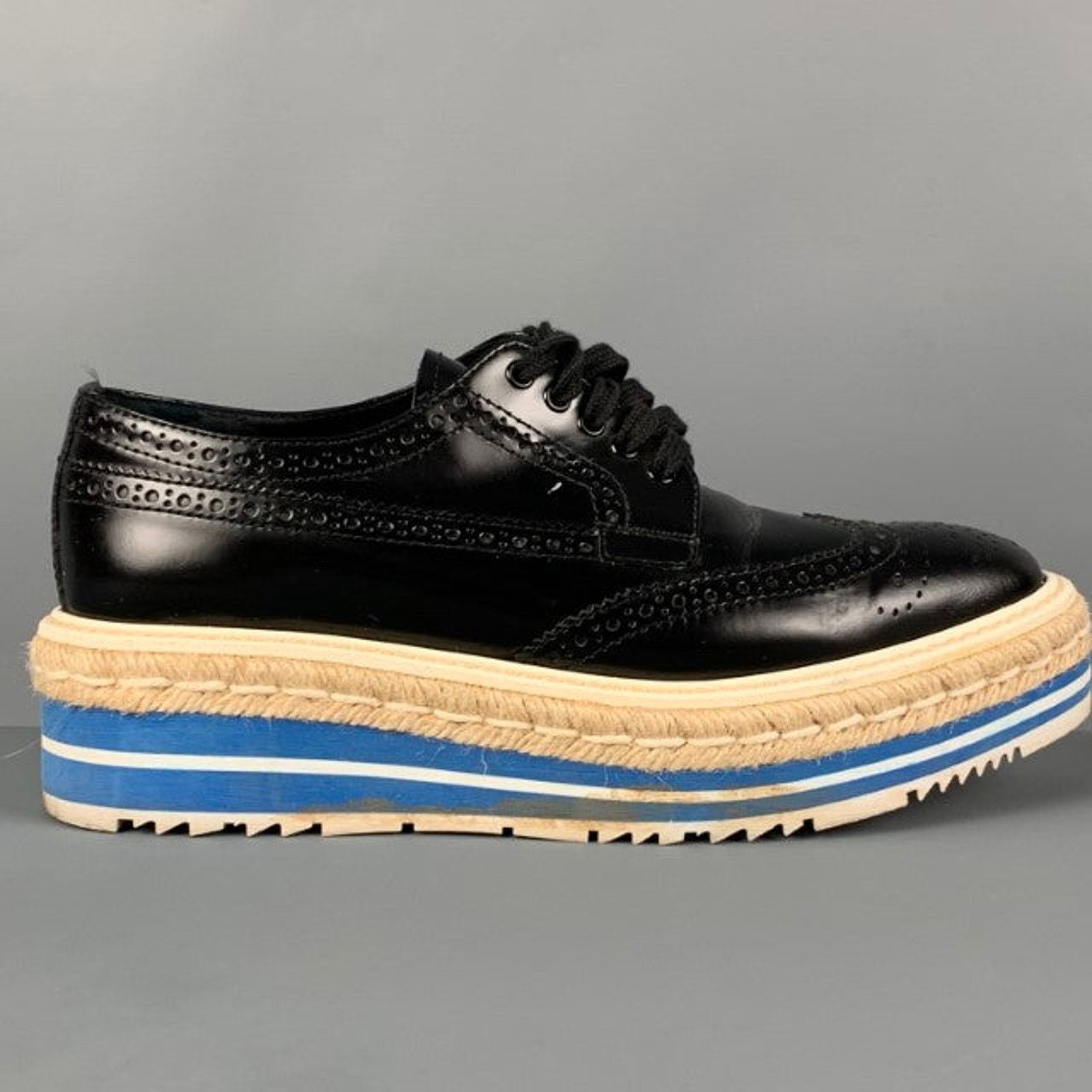 Prada PRADA Size 6.5 Black White Blue Perforated Wingtip Shoes Size US 6.5 / IT 36.5 - 1 Thumbnail