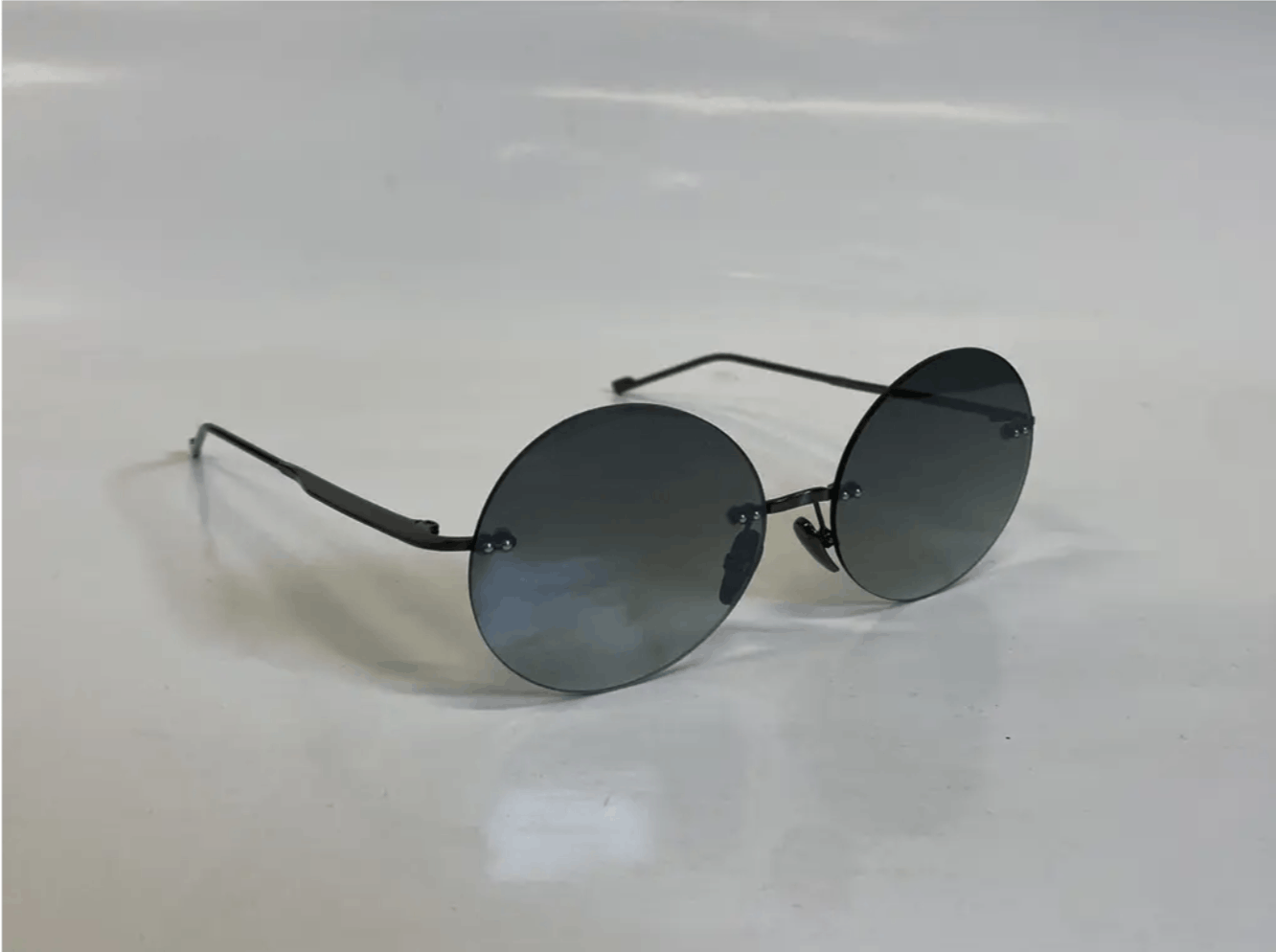 image of Courreges Courrèges Rounded Sunglasses in Black, Women's