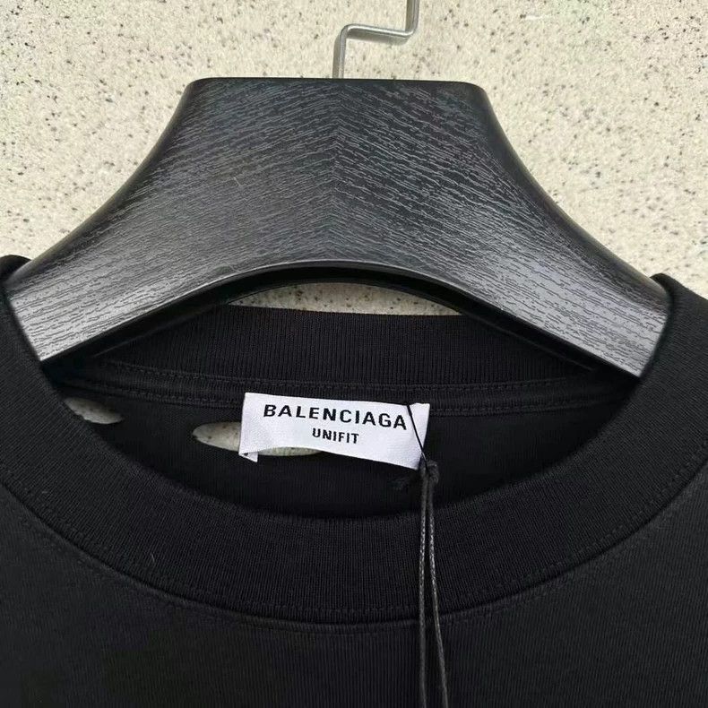 Balenciaga Balenciaga Plain black short sleeves with holes Size US S / EU 44-46 / 1 - 2 Thumbnail
