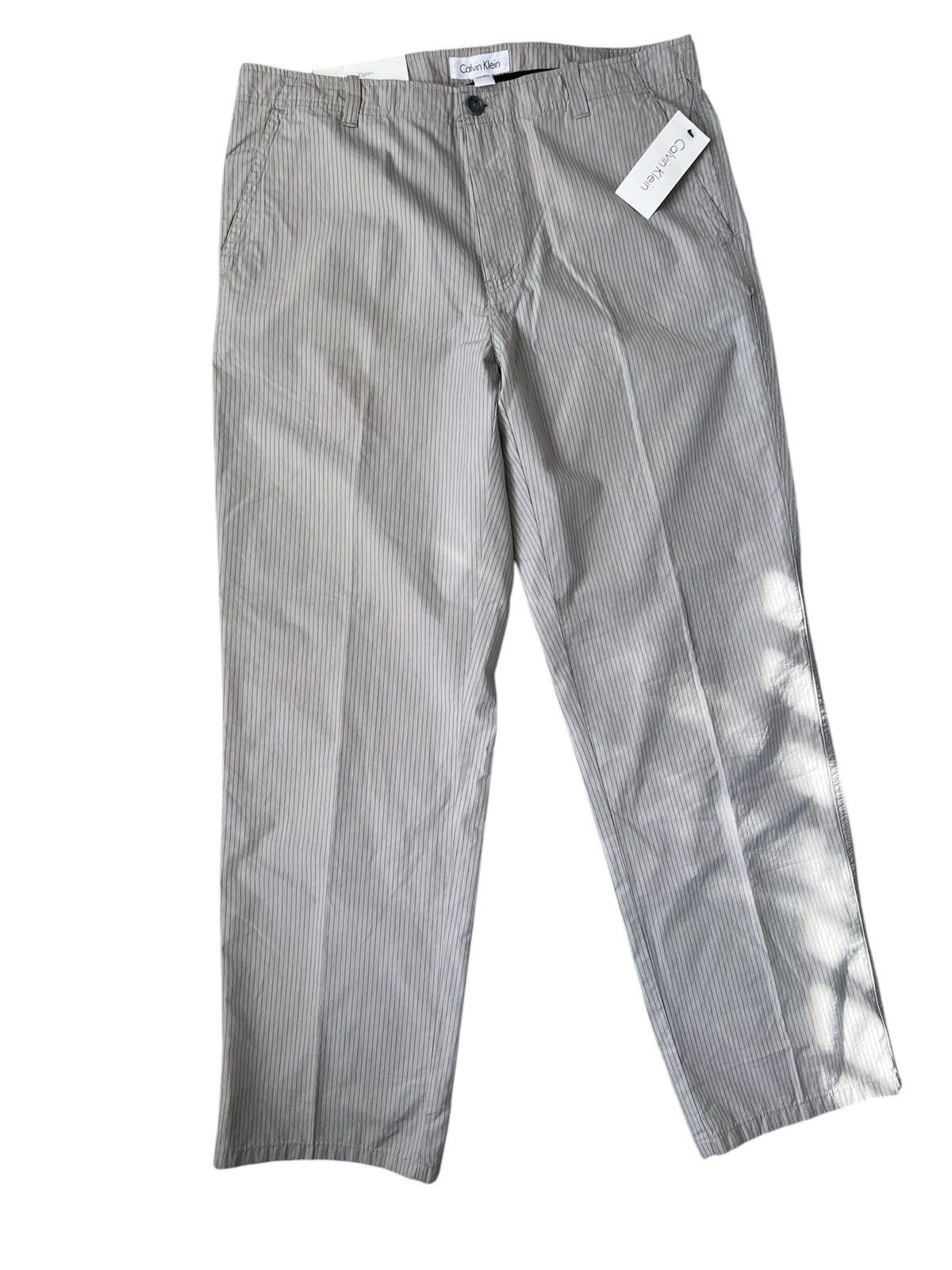 Calvin Klein Calvin Klein Men’s The Dylan Tapered Pants | 33W x 30L Size US 33 - 1 Thumbnail