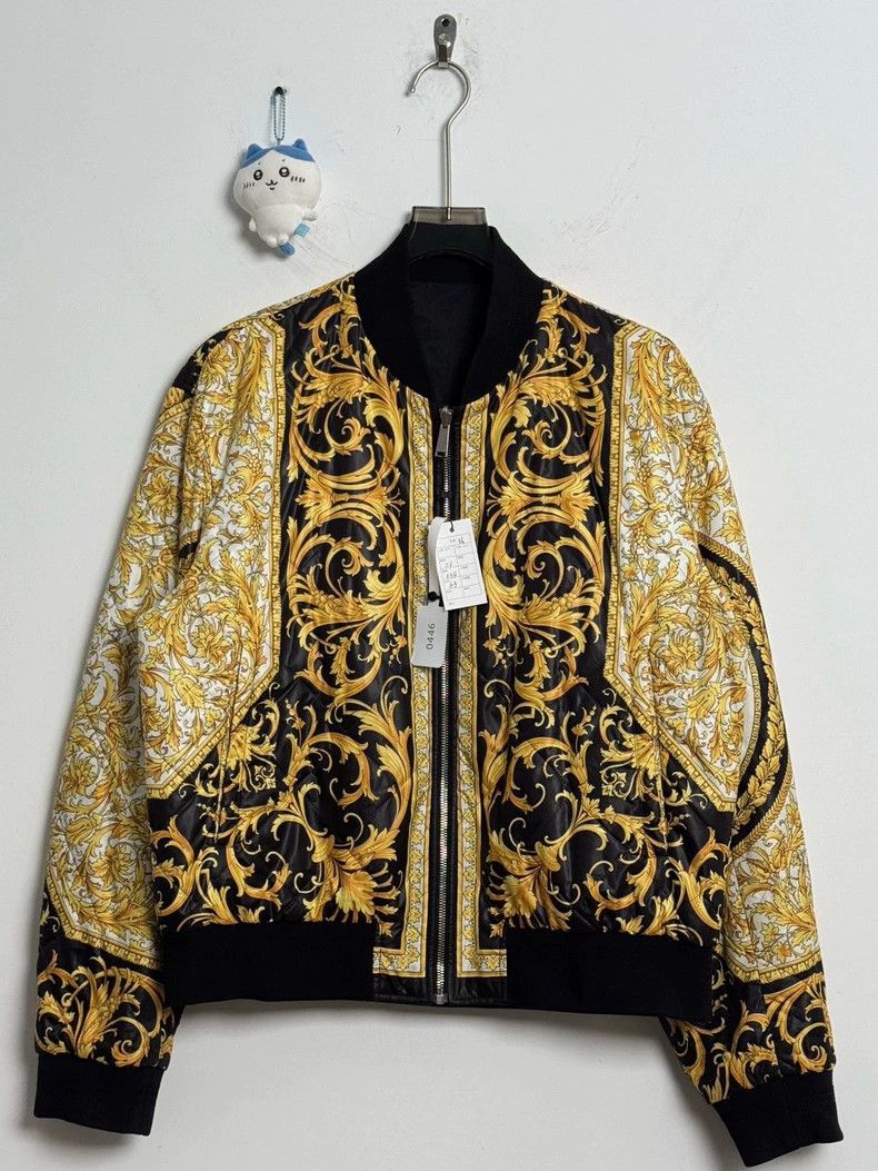 Versace The main line of black gold is reversible with a p