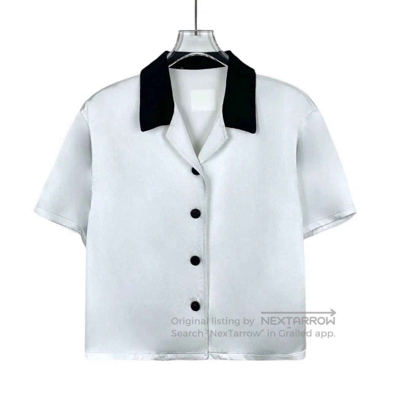 white short sleeve button-up shirt.