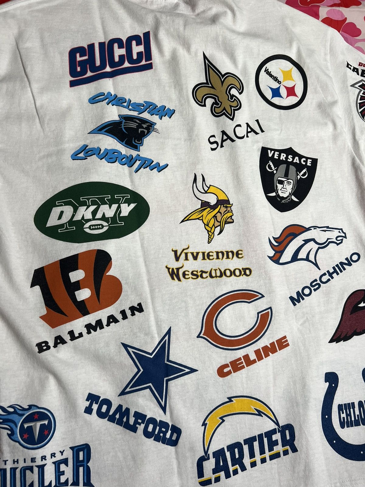 Market × NFL NFL Designer Logo’s x Chinatown Market Football Men’s XL Tee Size US XL / EU 56 / 4 - 4 Thumbnail