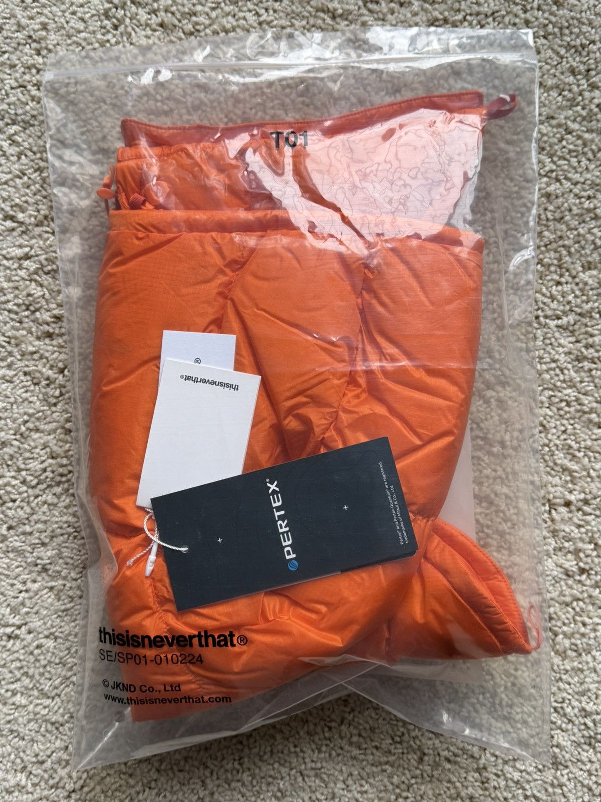 thisisneverthat thisisneverthat PERTEX® Puffer Balaclava Hood. Down. Orange. Size ONE SIZE - 8 Thumbnail