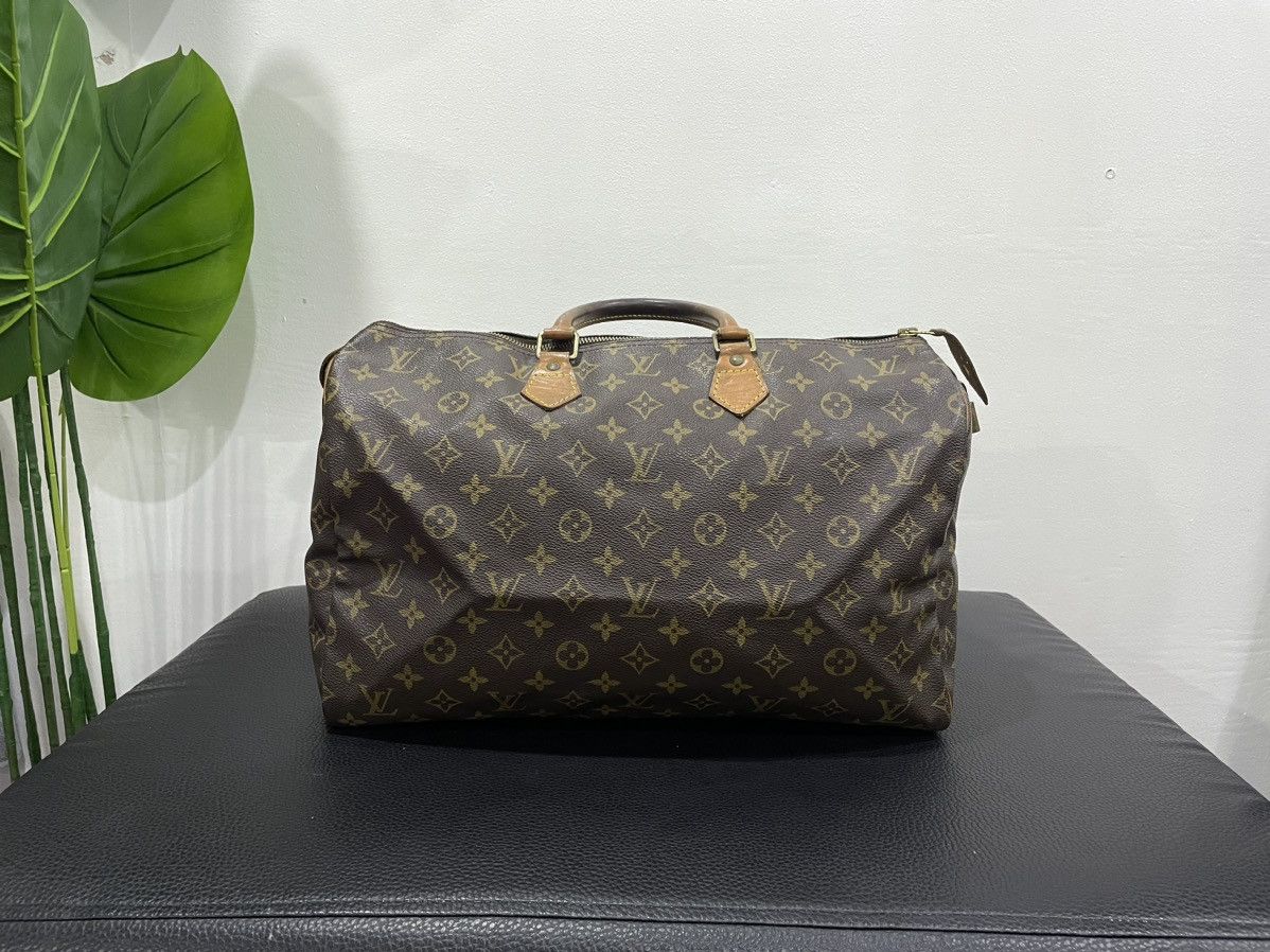 image of Louis Vuitton Speedy Duffle Bag in Brown, Men's