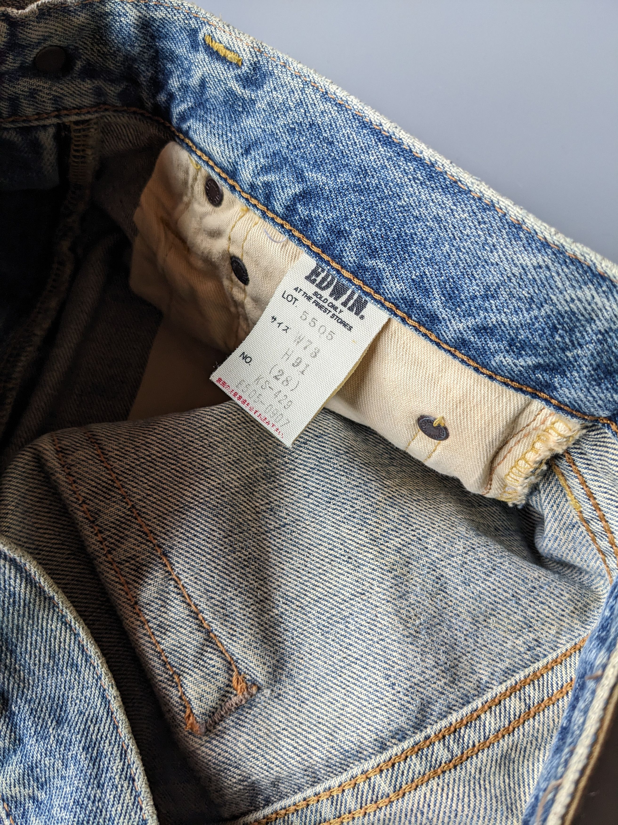 Edwin 505x faded blue distressed selvedge jeans