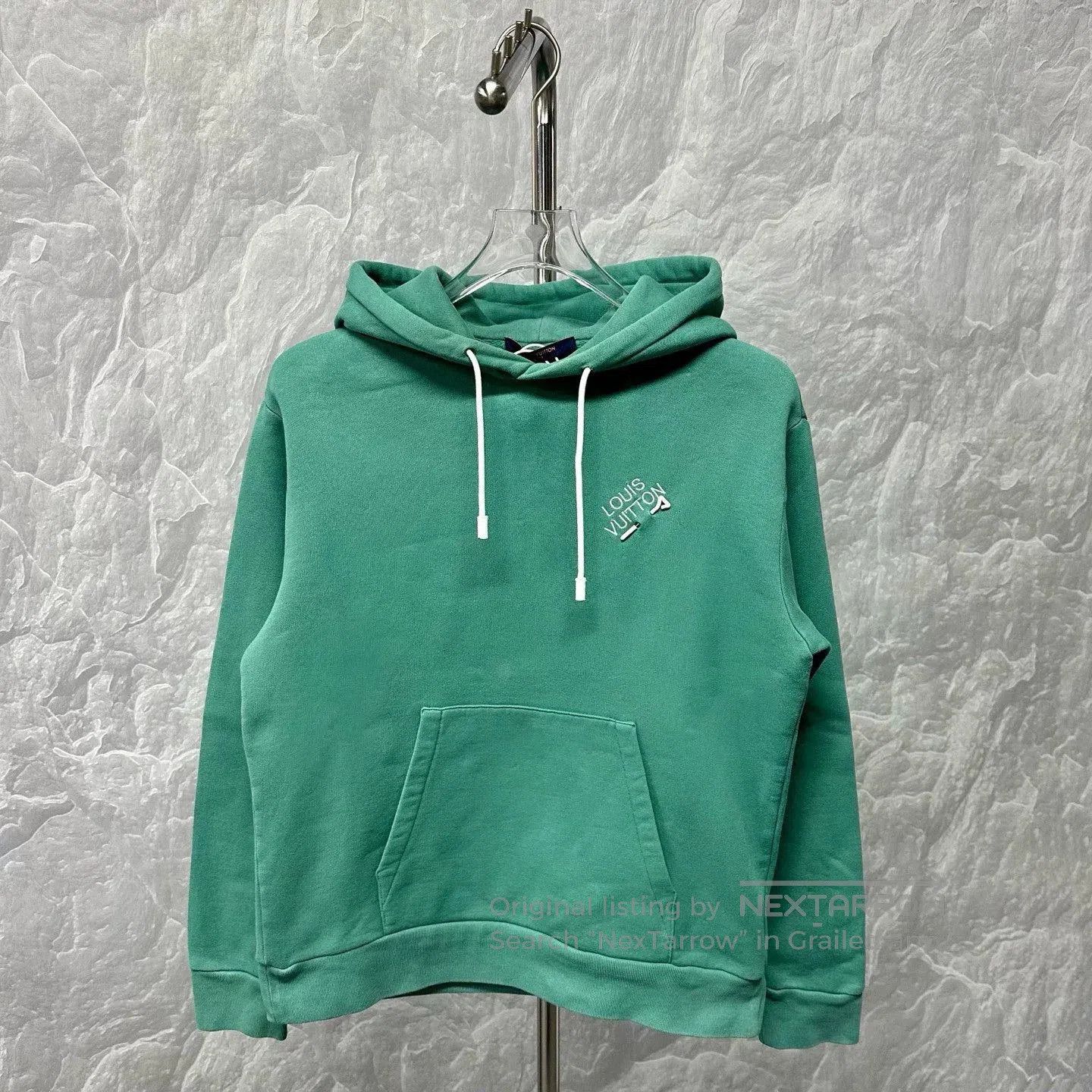 louis vuitton green hoodie with logo.