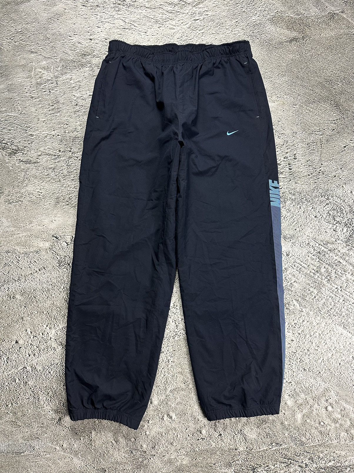 Nike × Vintage Nike track pants vintage navy nylon Y2K parachute baby blue Size US 34 / EU 50 - 1 Thumbnail