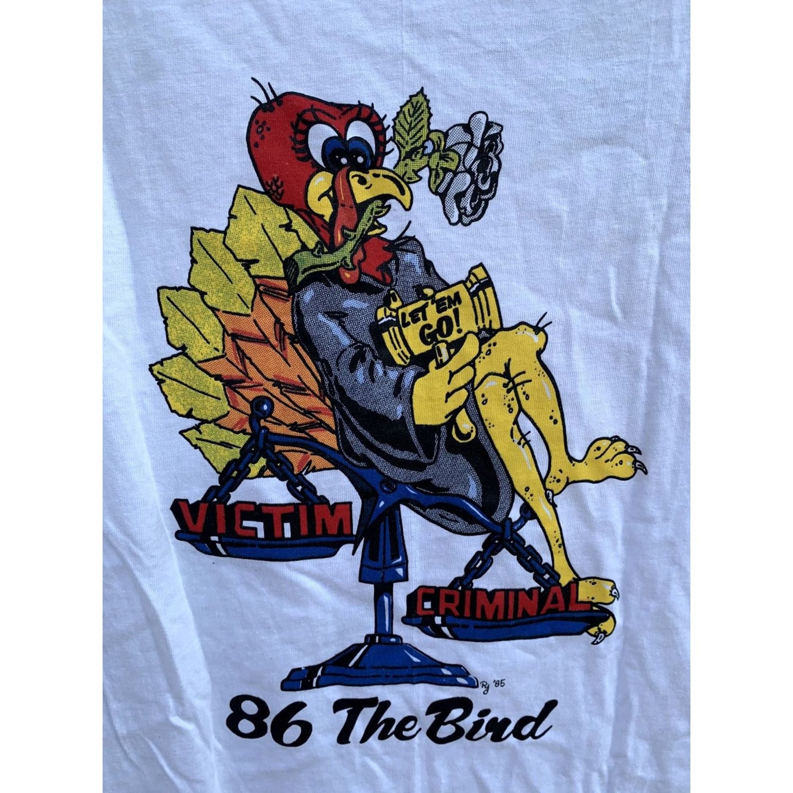 Hanes VINTAGE Hanes 86 The Bird Nov. ‘86 LET ‘EM GO! VICTIM CRIMINAL T Shirt M White 100% Cotton Short Sleeve Graphic Tee Mens Vintage 1980s Size US M / EU 48-50 / 2 - 7 Thumbnail