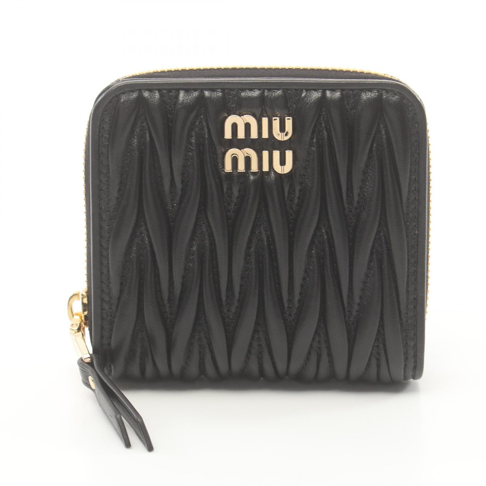 Miu Miu Miu Miu Matelasse Bi-Fold Wallet Leather Black Size ONE SIZE - 1 Thumbnail
