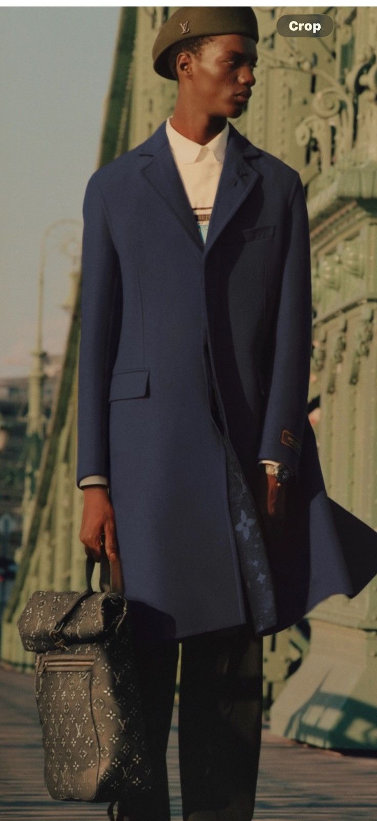 Louis Vuitton men’s overcoat. 50/40 $4500
