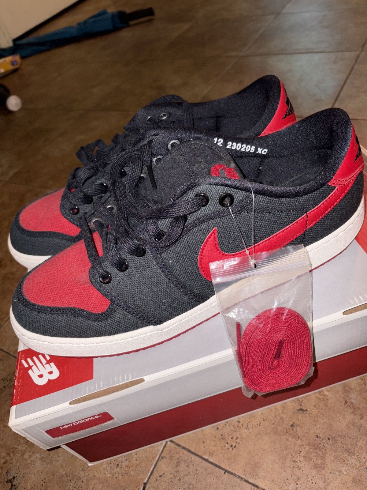 Jordan Brand Nike Air Jordan 1 Retro AJKO Low Bred Varsity Red White Size US 12 / EU 45 - 9 Thumbnail