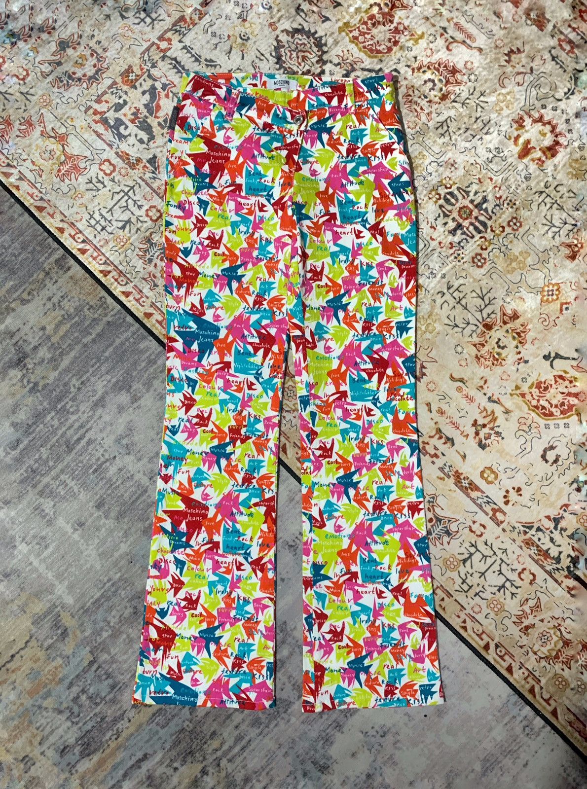 Moschino Multi coloured graphic all over print trousers