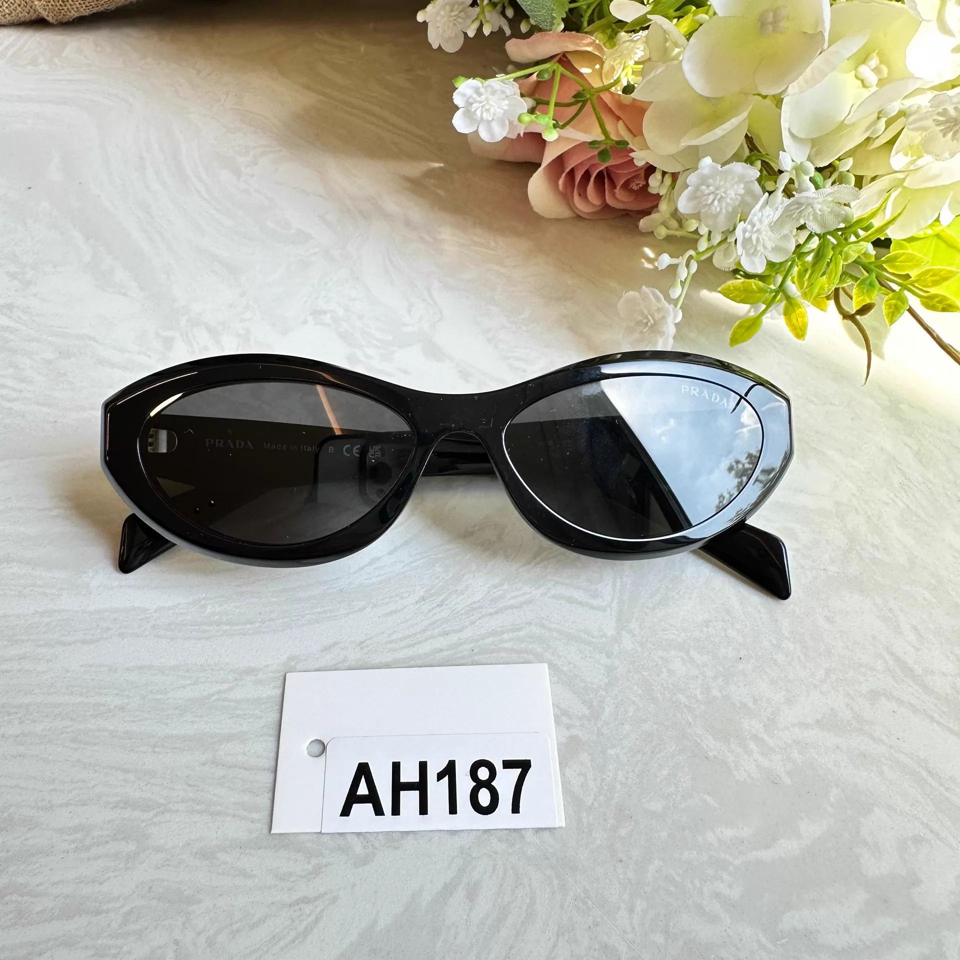 Prada Prada SPR 57L Triangle Logo Sunglasses | Grailed
