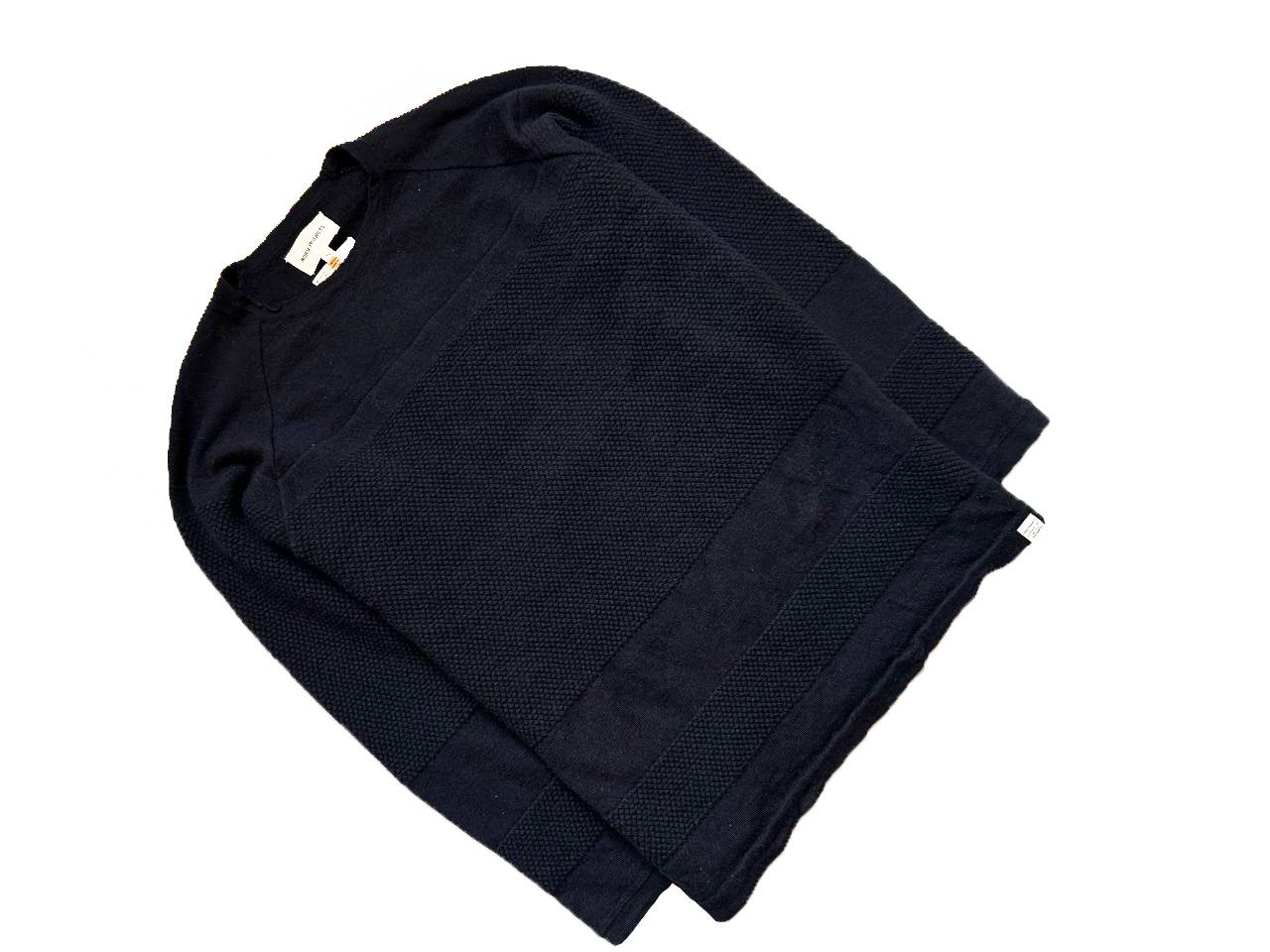 Knitted blue sweater Norse Projeckts made of wool.