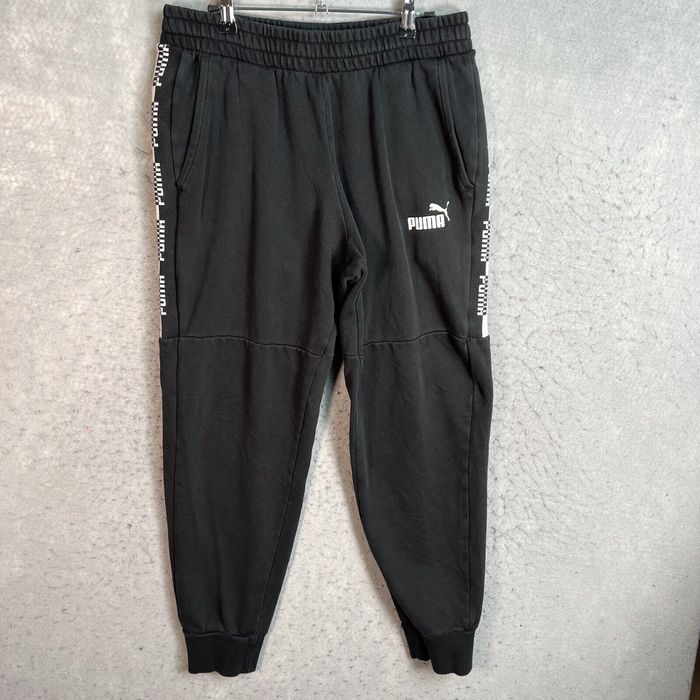 Puma logo 2025 stripe drawstring sweatpants